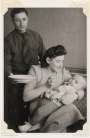 Unknown man with Miriam feeding Alex